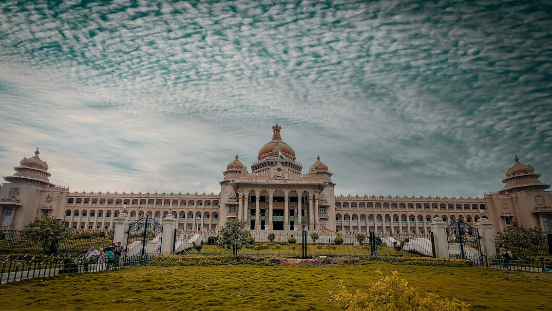 Parliament building exterior under a bright sky